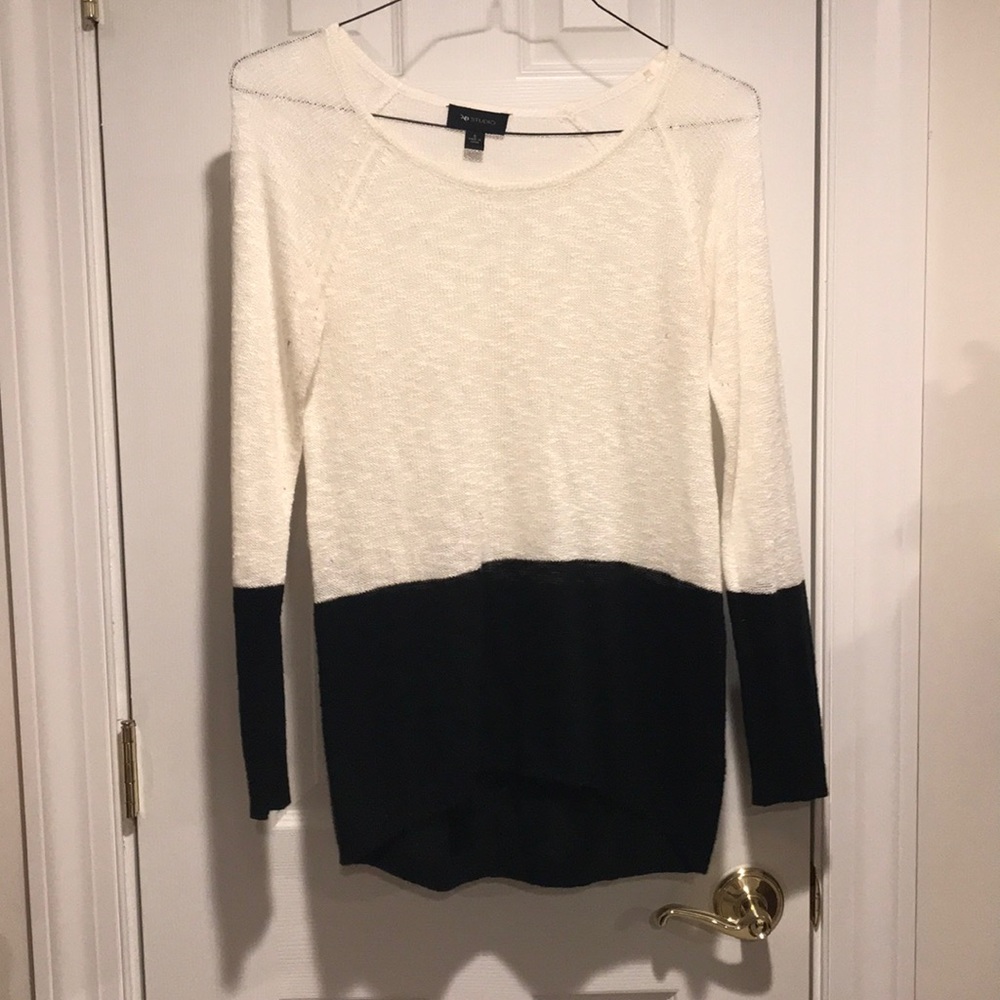 White and black sweater